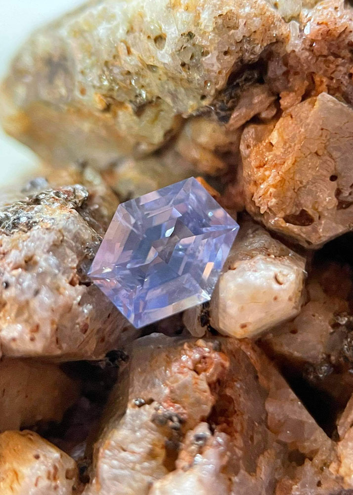 Orstadiusuntreated Nivitihigala mined and cut sapphire web