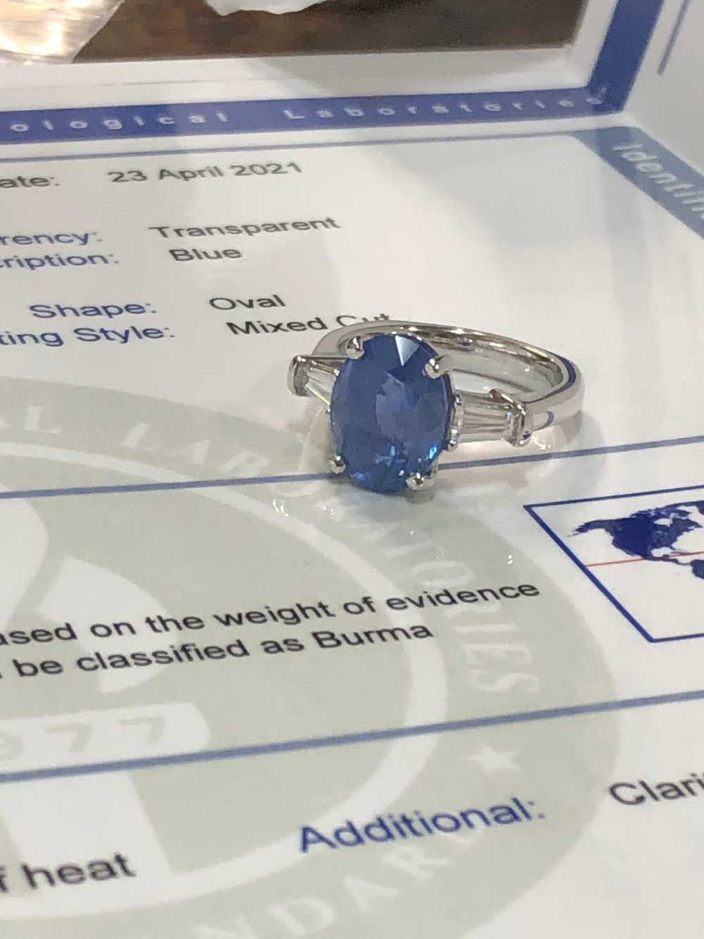 Burmese sapphire with its certification report